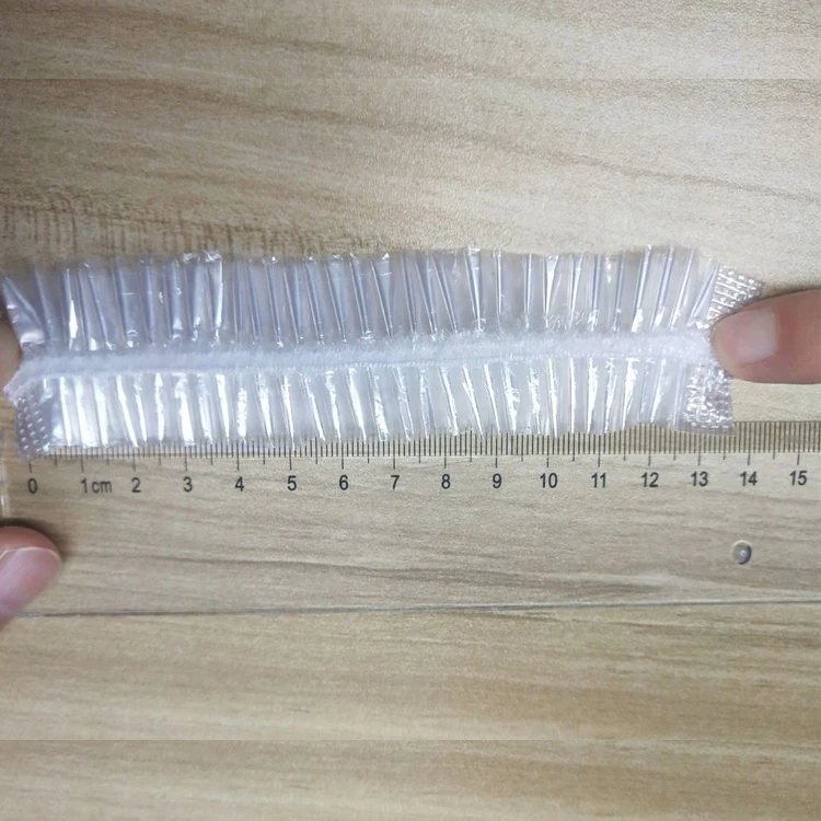 หมวกคลุมผมอาบน้ำแบบใช้แล้วทิ้งที่ทำจากพลาสติก HDPE ย่อยสลายได้ทางชีวภาพคุณภาพสูง เป็นมิตรต่อสิ่งแวดล้อม ผ่านการรับรอง ISO CE SGS สำหรับโรงแรม สปา ทำความสะอาด ป้องกันฝุ่น
