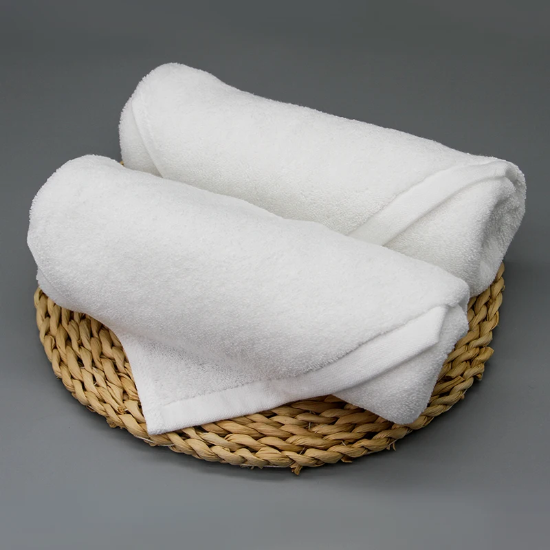 Luxury 100% Cotton Bath Towel Set Custom Jacquard Logo Quick-dry Compressed Knitted Solid Color Disposable For Spa Hotels