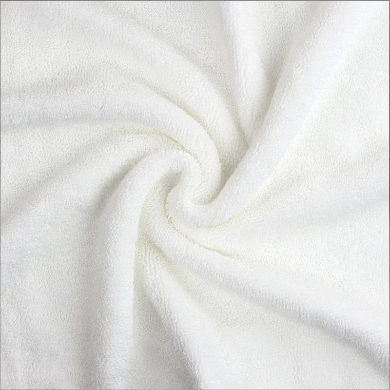 Toalla de hotel de lujo blanca lavable con logotipo bordado de color liso desechable comprimida de secado rápido 80 X 180 cm 600-800 gsm