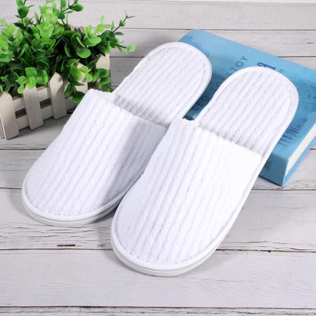 Zapatillas desechables de dormitorio de hotel personalizables de algodón blanco y velour con suela de EVA, cómodas y de punta cerrada, con logotipo de fábrica para hoteles