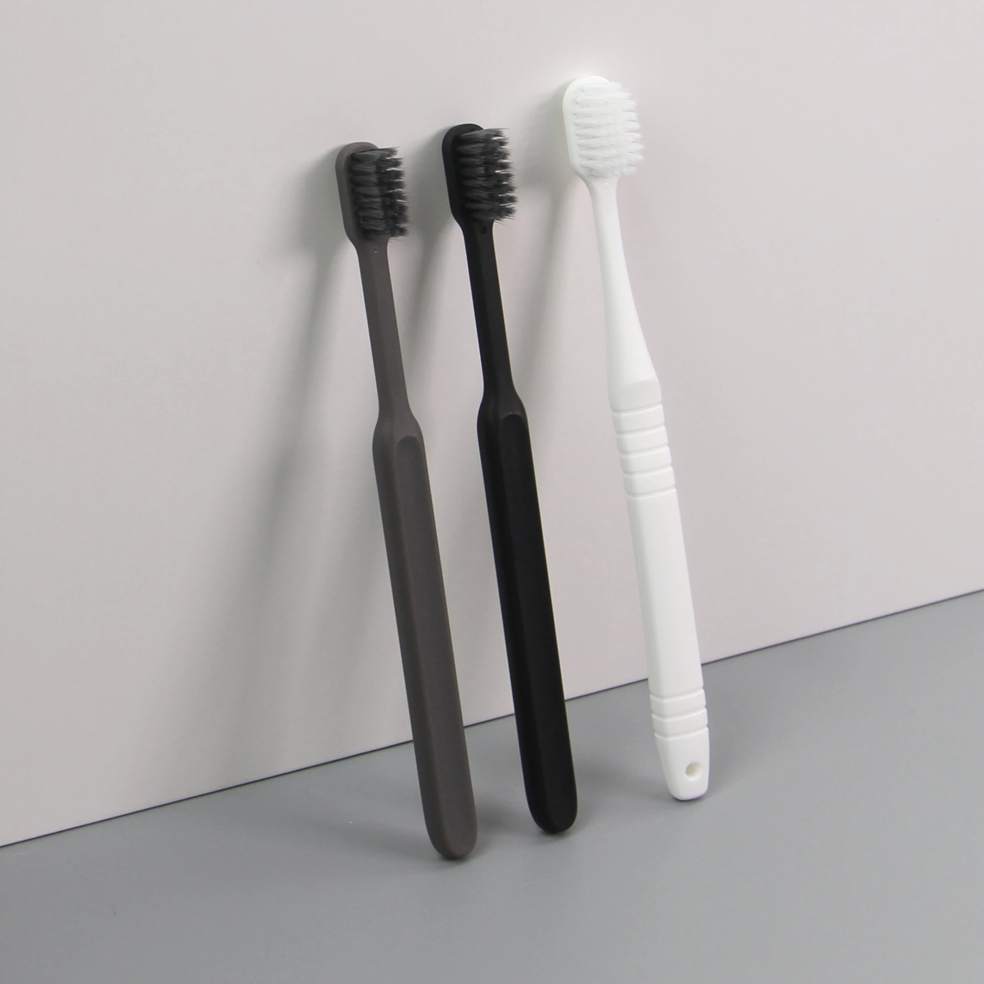 Nuevo diseño de cepillo de dientes desechable conveniente para huéspedes de hotel, higiene suave y portátil, cuidado y limpieza con cuentas efervescentes