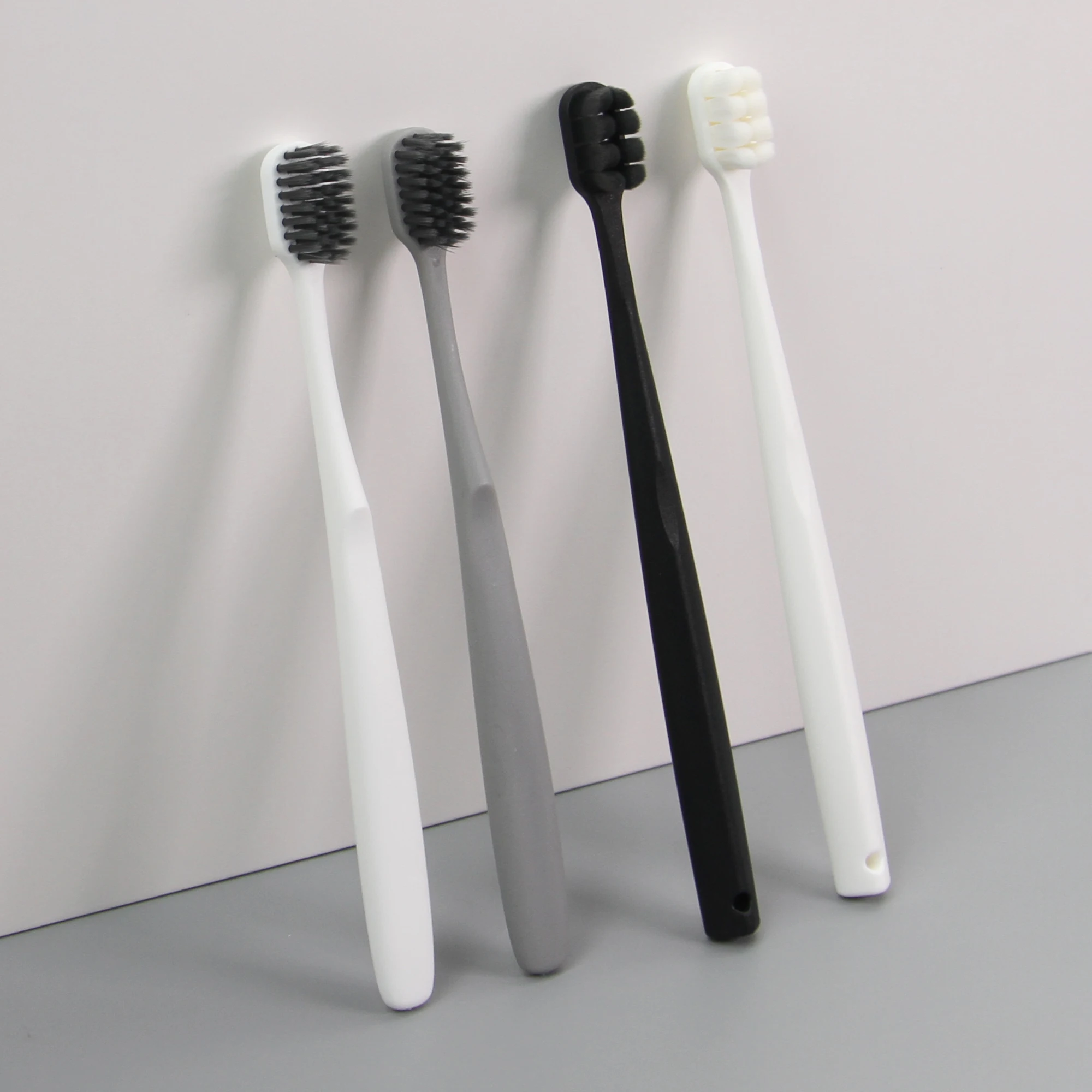 Nuevo diseño de cepillo de dientes desechable conveniente para huéspedes de hotel, higiene suave y portátil, cuidado y limpieza con cuentas efervescentes