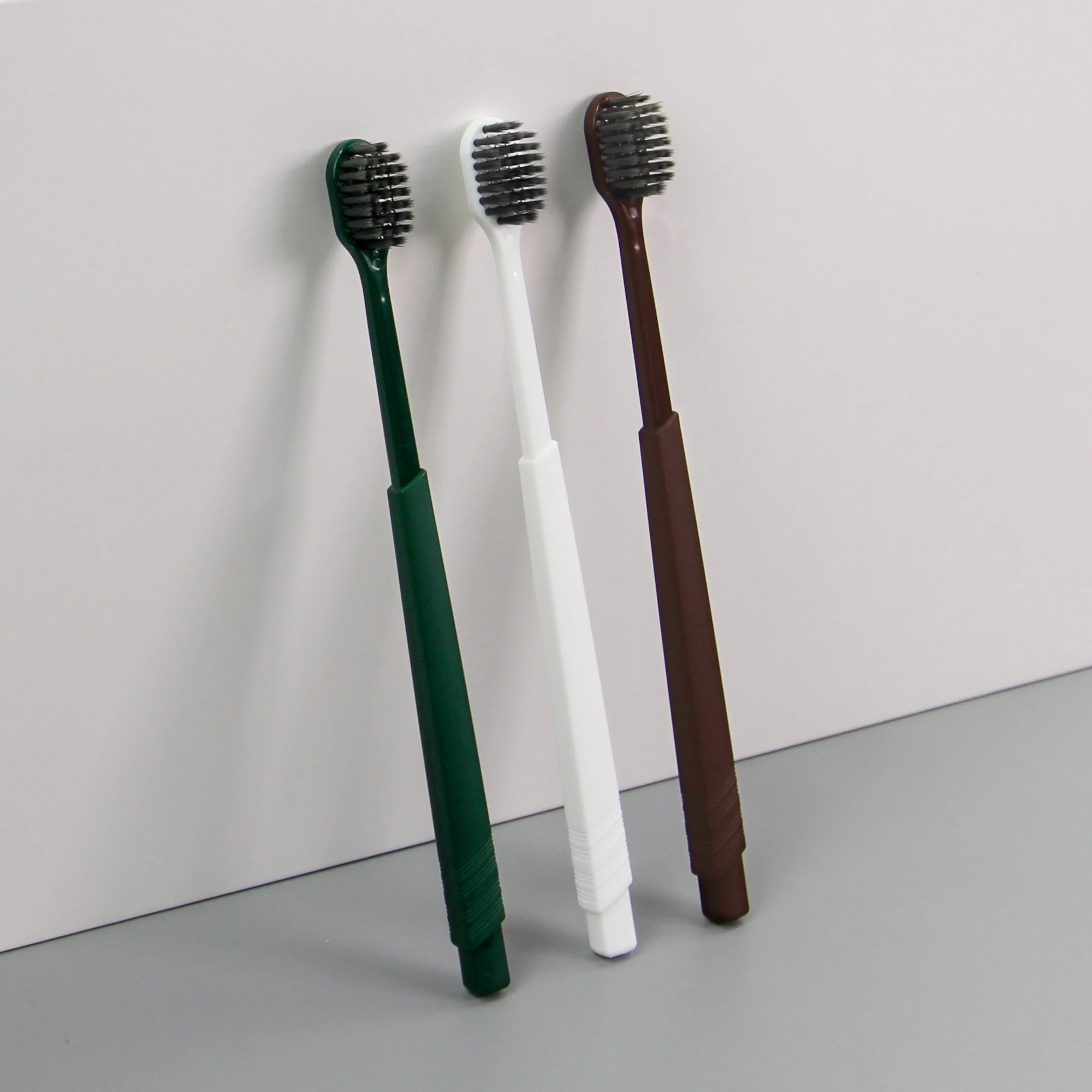 Nuevo diseño de cepillo de dientes desechable conveniente para huéspedes de hotel, higiene suave y portátil, cuidado y limpieza con cuentas efervescentes